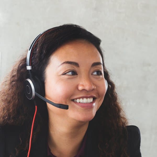 A customer service rep wearing a headset
